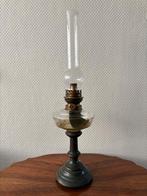 Art Deco olielamp met een glazen reservoir en metalen voet., Ophalen of Verzenden