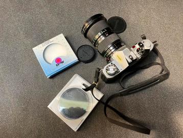 Canon AV 1 met FD 35-105 mm , lees beschikbaar voor biedingen