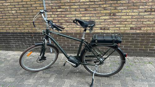 Electrische heren fiets, Fietsen en Brommers, Elektrische fietsen, Gebruikt, Overige merken, 50 km per accu of meer, Ophalen