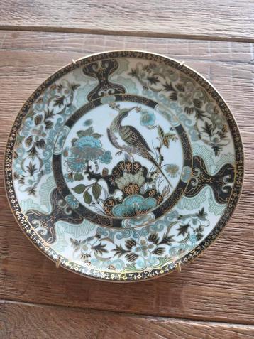 Vintage decoratieve wandbord met vogelmotief beschikbaar voor biedingen