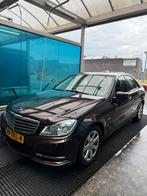 Mercedes-Benz C-Klasse C180 BE Aut7 2012 Bruin, Auto's, Mercedes-Benz, Automaat, 745 kg, Achterwielaandrijving, Bruin