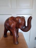 Houten olifant, Ophalen