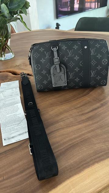 Louis vuitton city keepall 2025 beschikbaar voor biedingen