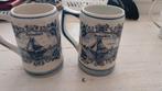 7 x delfts blauwe mokken. Heineken, brand en skoll, Ophalen of Verzenden, Zo goed als nieuw, Glas of Glazen, Heineken