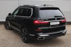 BMW X7 M50i High Executive Automaat / Panoramadak Sky Lounge, Gebruikt, 4395 cc, 7 stoelen, Zwart