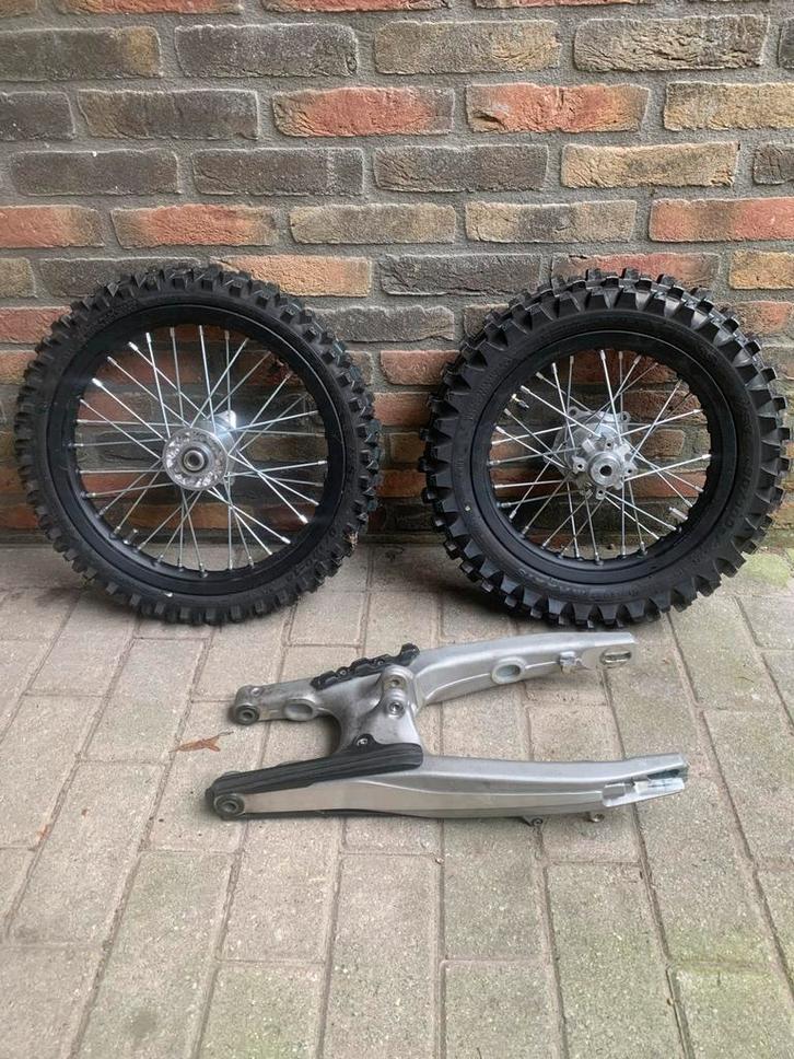 Nieuwe Kleine Wielen + Standaard Achterbrug husqvarna 65 cc, Motoren, Onderdelen | Overige, Nieuw, Ophalen of Verzenden