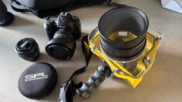 Nikon D7100 DSLR + SPL Surf/Waterhousing en twee objectieven beschikbaar voor biedingen