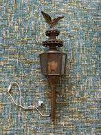 Lamp met adelaar, Ophalen