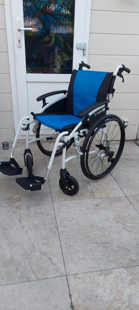 G logic Excel  nieuwstaat Ook in bruine  vlotte  rolstoel, Diversen, Rolstoelen, Zo goed als nieuw, Duwrolstoel, Ophalen of Verzenden