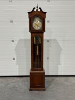 Mooie staande klok, Ophalen