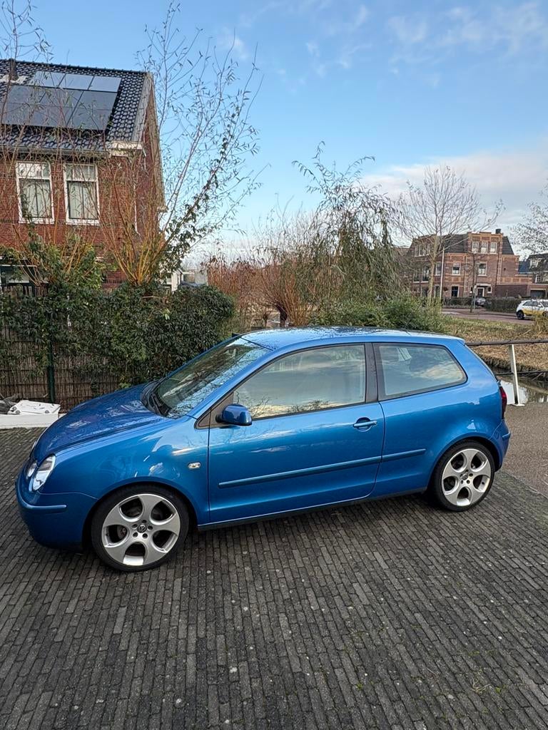 Volkswagen Polo 1.4 63KW FSI 2003 Blauw, Auto's, Voorwielaandrijving, 40 €/maand, 4 cilinders, Blauw
