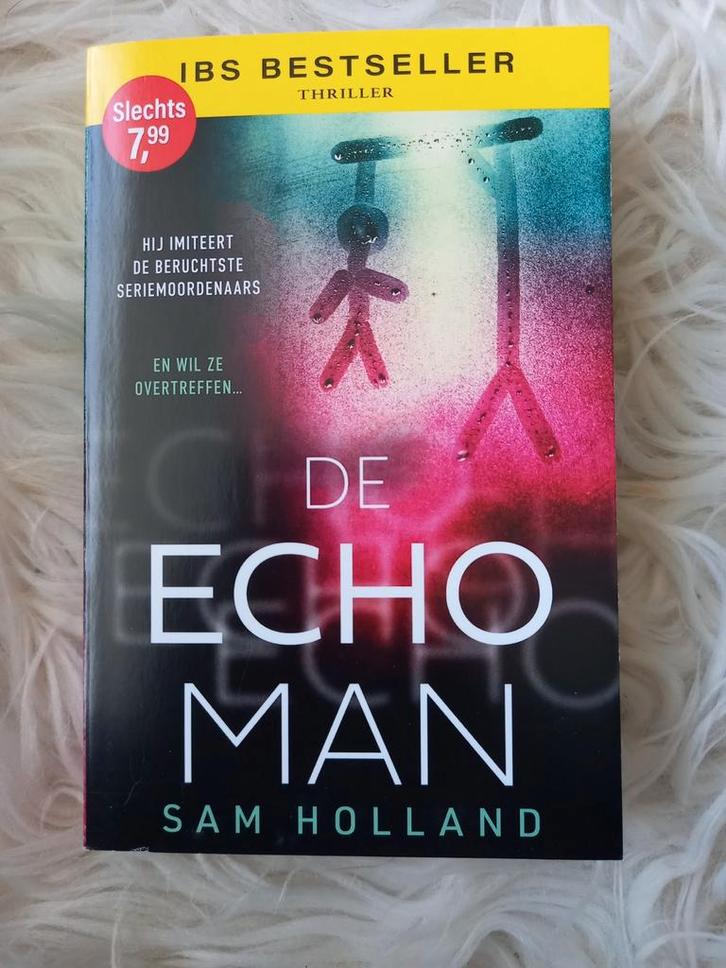 d8 De Echo Man - Sam Holland, Boeken, Thrillers, Zo goed als nieuw, Ophalen of Verzenden