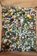 Grote verzameling knikkers, Ophalen