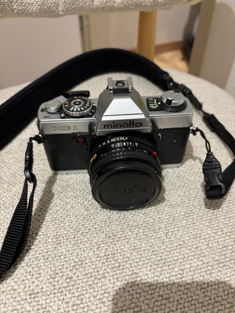 Minolta XG1 met MD Rokkor 1.7/50mm en Sigma Zoom 120-300mm, Audio, Tv en Foto, Fotocamera's Analoog, Zo goed als nieuw, Spiegelreflex
