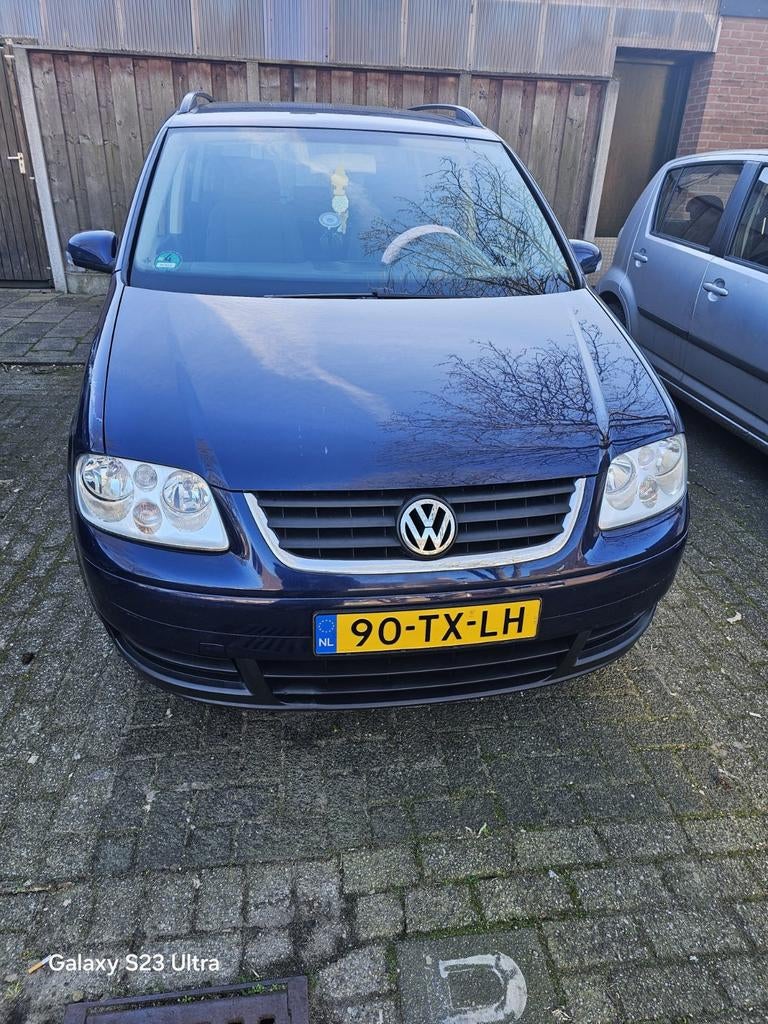 Volkswagen Touran 1.6 85KW AUT 2006 Blauw, Auto's, Volkswagen, 4 cilinders, Blauw, 7 stoelen, 115 pk