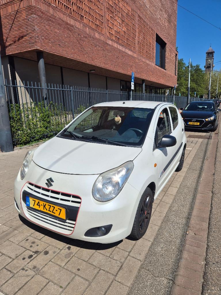 Suzuki Alto 1.0 2010 Wit, Auto's, Voorwielaandrijving, Stof, 200 kg, 4 stoelen