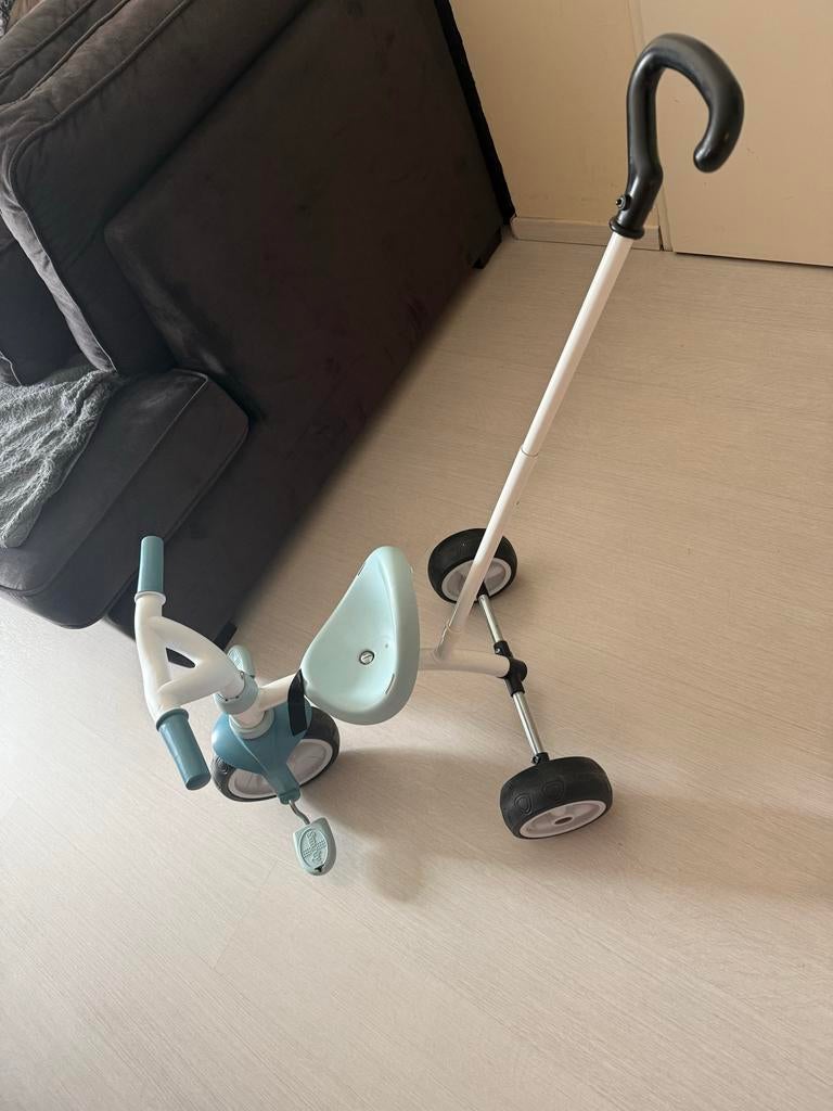 Blauwe driewieler met duwstang, Ophalen of Verzenden, Gebruikt, Duwvoertuig