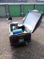 Motor bagagewagen., Ophalen