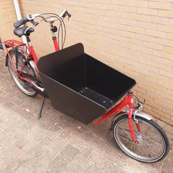 Bakfiets + huif + maxicosi houder beschikbaar voor biedingen
