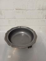 tinnen schaal, Ophalen
