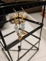 Schattige oorbellen van stainless steel met zeesterren, Overige materialen, Hangers, Blauw, Nieuw