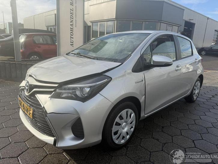 Toyota Yaris 1.5 Hybrid Aspiration Autm (bj 2016, automaat), Auto diversen, Schadeauto's, Toyota, Automaat, Hybride Elektrisch/Benzine