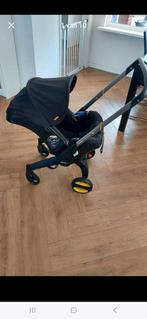 Doona kinderwagen en autostoel in een, Zo goed als nieuw, Combiwagen, Verstelbare duwstang, Ophalen
