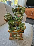 Porselein foo dog, Ophalen