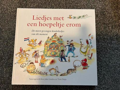 T. Duijx - Liedjes met een hoepeltje erom, Boeken, Kinderboeken | Jeugd | onder 10 jaar, Zo goed als nieuw, Ophalen of Verzenden