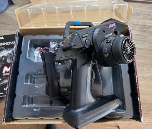 Sanwa M12 Zender inclusief accu, Hobby en Vrije tijd, Modelbouw | Radiografisch | Auto's, Gebruikt, Onderdeel, Overige typen, Overige schalen