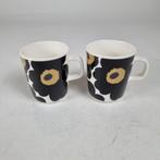 Marimekko Unikko mok wit zwart goud 2,5dl (2 stuks), Ophalen, Keramiek, Nieuw, Overige stijlen