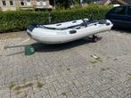 Rubberboot met buitenboordmotor en trailer boottrailer, Watersport en Boten, Rubberboten, Ophalen, Nieuw
