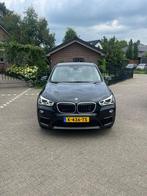 BMW X1 xDrive20i Executive, Auto's, BMW, Stof, Gebruikt, Euro 6, 2000 kg