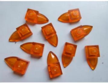 nr. 5854, 10 Transparante oranje tanden. Verzenden mogelijk beschikbaar voor biedingen