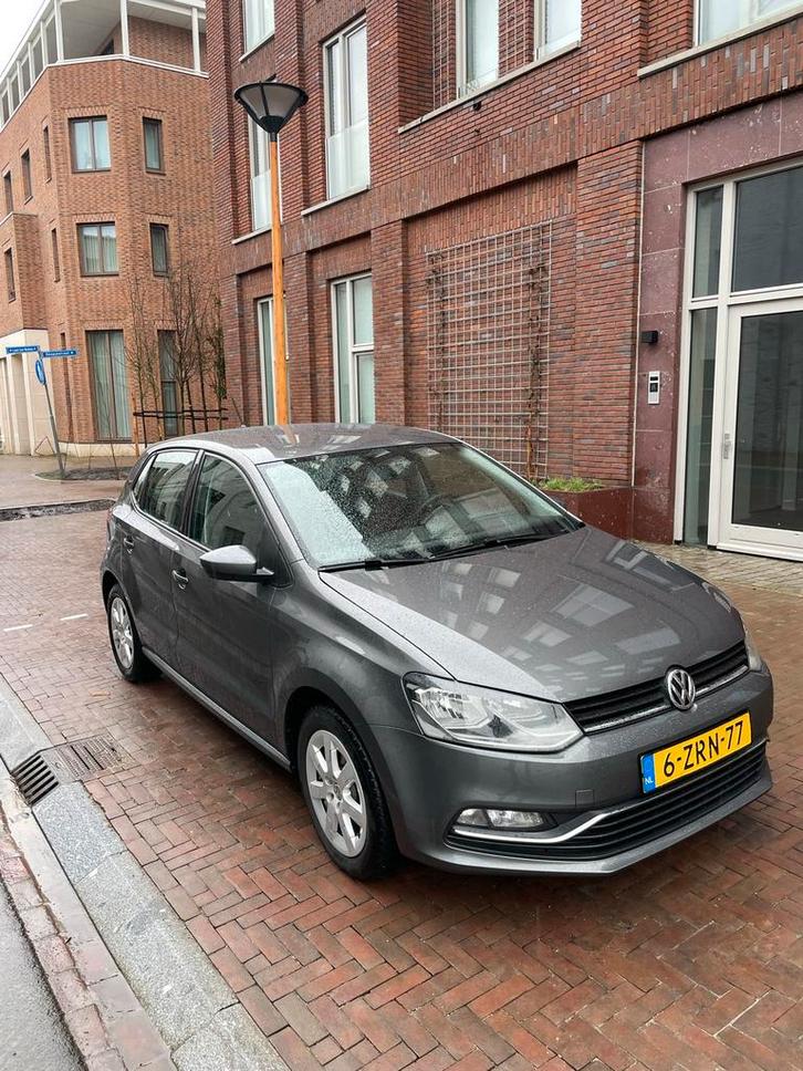 Volkswagen Polo 1.2 TSI 66KW 2015 Grijs, Auto's, Volkswagen, Particulier, Polo, Airbags, Airconditioning, Alarm, Bluetooth, Centrale vergrendeling