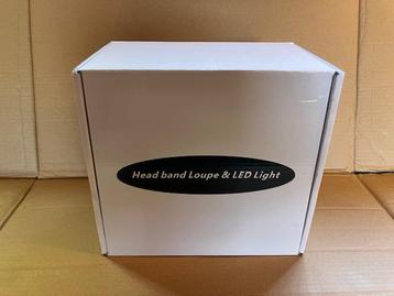 medische hoofdlamp met loupe (3,5 keer vergroting) beschikbaar voor biedingen