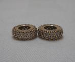 Pandora 14 kt gouden set 2 spacers met zirkonia  nr.1776