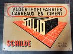 Bord Blik vloertegelfabriek Solid uit Schilde uit 1949, Ophalen of Verzenden, Gebruikt, Reclamebord