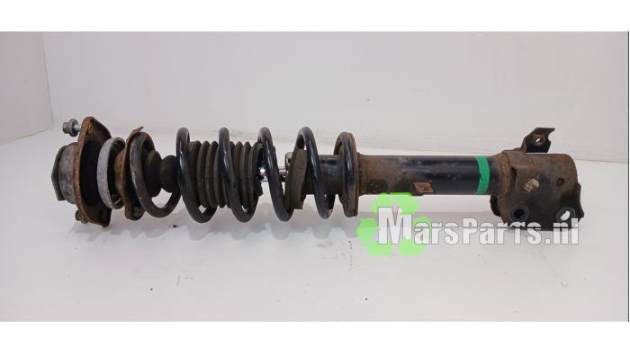 Schokdemper links-voor van een Daihatsu Cuore, Auto-onderdelen, Ophanging en Onderstel, Daihatsu, Gebruikt, 3 maanden garantie