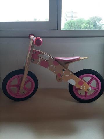 roze houten loopfietsje € 12,50 beschikbaar voor biedingen