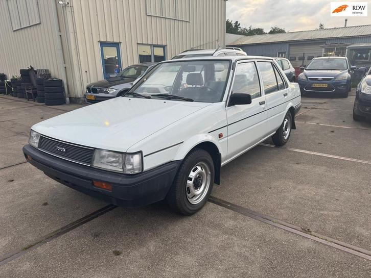 Toyota Corolla 1.3 DX, Auto's, Toyota, Bedrijf, Te koop, Corolla, Benzine, Sedan, Handgeschakeld, Geïmporteerd, Wit, Blauw, Leder en Stof