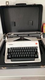 Olympia typmachine met koffer en nieuw lint., Diversen, Typemachines, Ophalen of Verzenden, Zo goed als nieuw