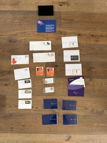 telefoonkaarten en postzegelmapjes speciale postpenning enz beschikbaar voor biedingen