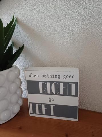 Te koop: Leuk tekstbord "When nothing goes RIGHT, go LEFT" beschikbaar voor biedingen