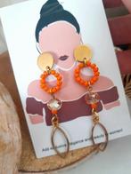 Nieuwe oorbel oranje, Ophalen of Verzenden, Nieuw, Oranje, Overige materialen