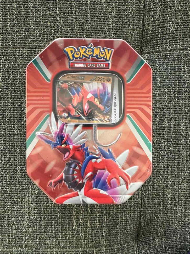 5x Pokemon Paldea Legends Tin: Koraidon., Hobby en Vrije tijd, Verzamelkaartspellen | Pokémon, Ophalen of Verzenden