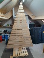 Te koop kerstboom van hout, Ophalen