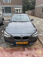 Bmw 1 serie 114i. Lees beschijving, Auto's, BMW, Achterwielaandrijving, Zwart, Leder, Handgeschakeld