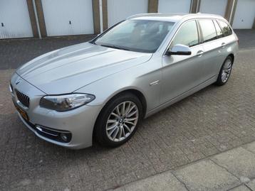 BMW 5-serie Touring 520i High Luxury Edition beschikbaar voor biedingen