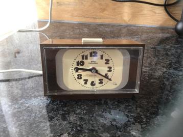 Vintage elektrische wekker Commodoor in perfecte staat beschikbaar voor biedingen
